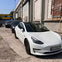 Tesla Shop - сервіс та прошивка Tesla.